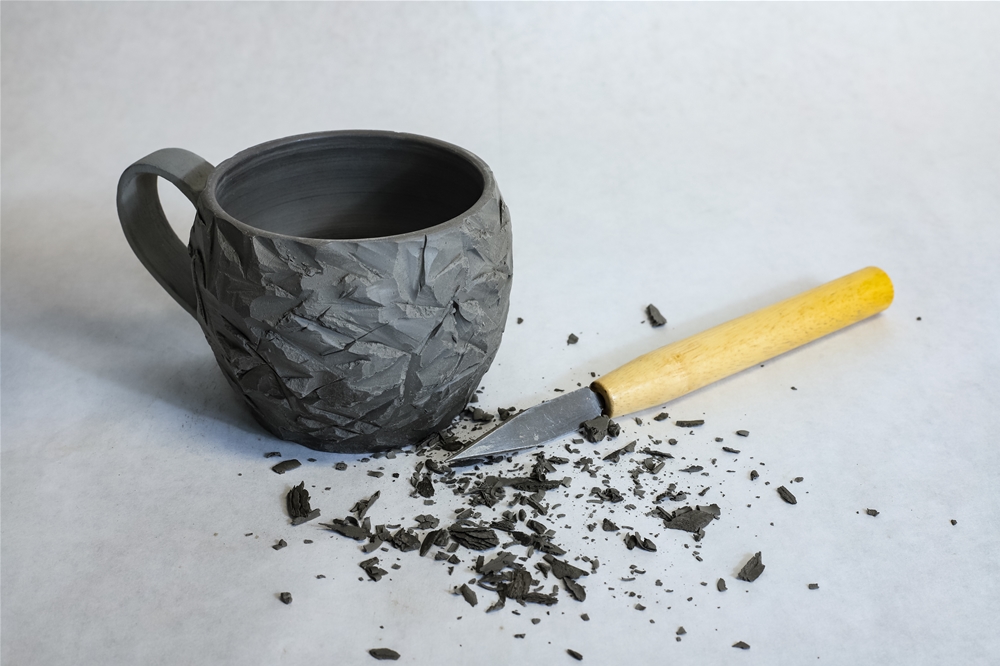 Tasse en garnissage écorché